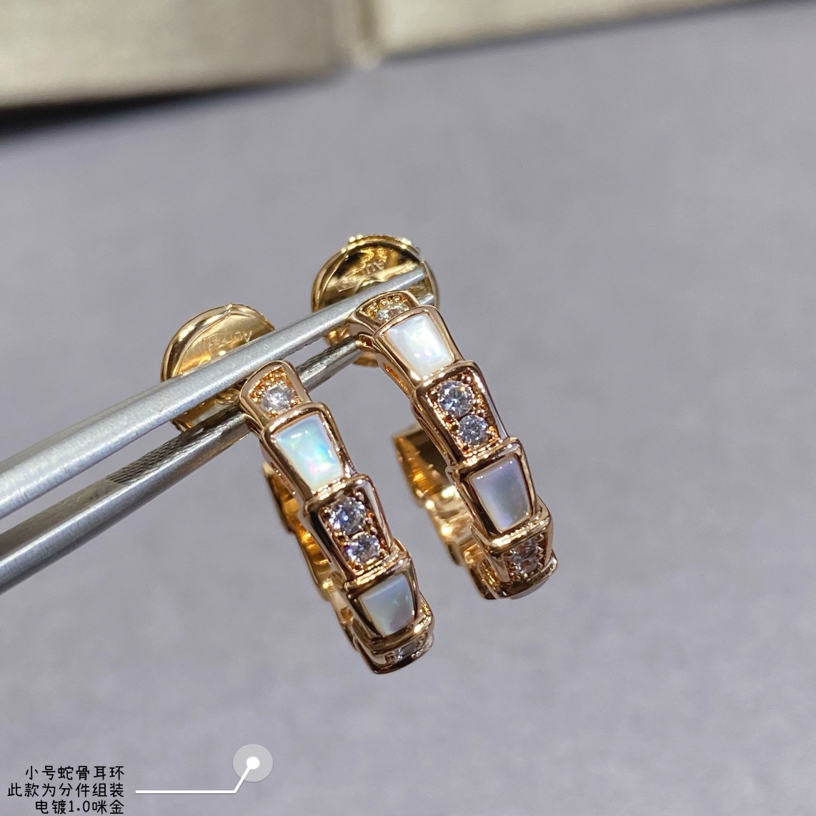 B*l*ai small snake bone earrings